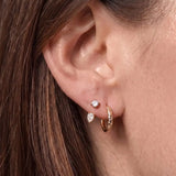 heroyne Stargazing Diamond Hoops worn on the ear with the Pear Diamond Earring Jacket